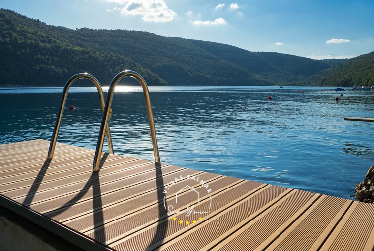 Turquoise Adriatic bay below Villa Vlastelini II, eastern Istria