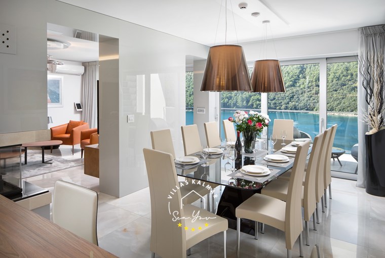 Modern open-plan kitchen and dining room with sea panorama – Villa Vlastelini II