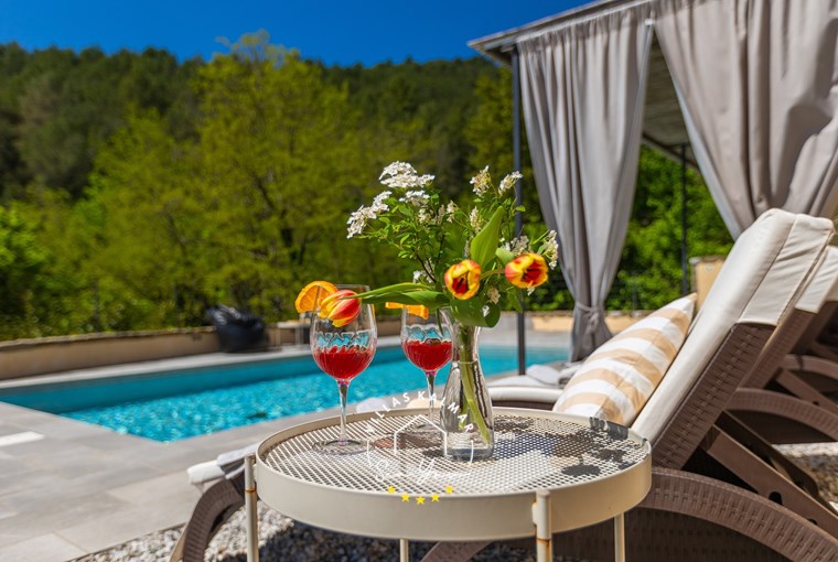 Sunloungers by the pool of villa near Motovun