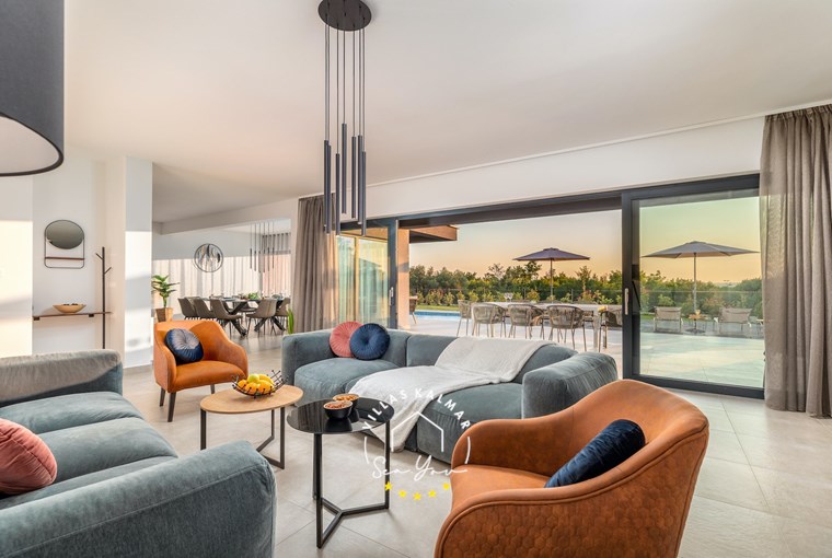 Cozy living room with pool view