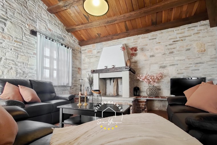 Comfortable livingroom with fireplacein villa