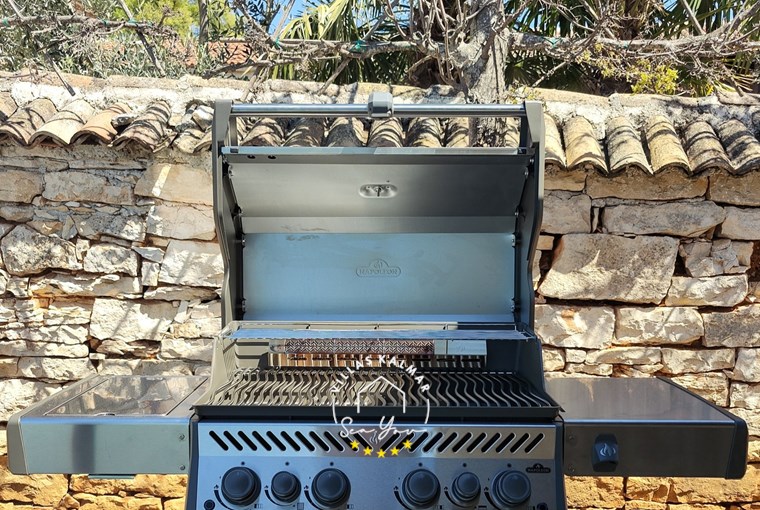 Grill for BBQ in yard of villa