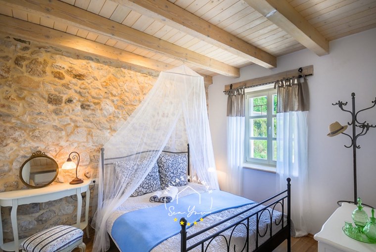 Comfortable double bedroom with natural light – Villa Amore Croatia