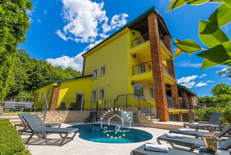 Villa with private pool and sun loungers surrounded by nature near Opatija