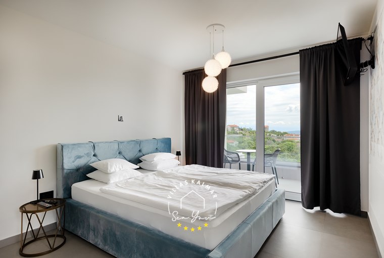 Luxurious bedroom with double bed and terrace in Villa Lavinia near Opatija