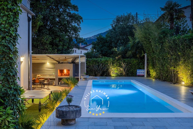 Outdoor private pool with table tennis and covered dining area in Villa Lovran near Opatija