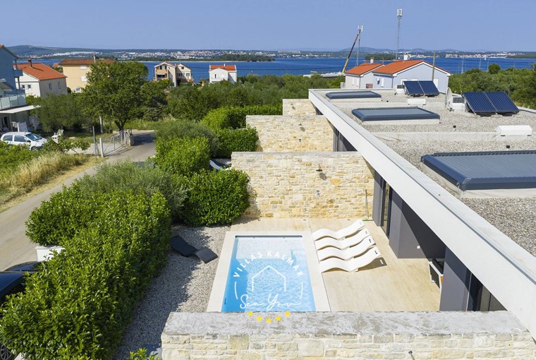 Villa K2 within the Homes4You row villa complex on the island Pasman 100m from the sea