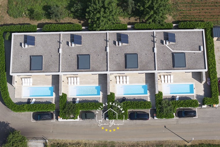 Aerial view of Villa K3 on Pasman Island near the sandy beach