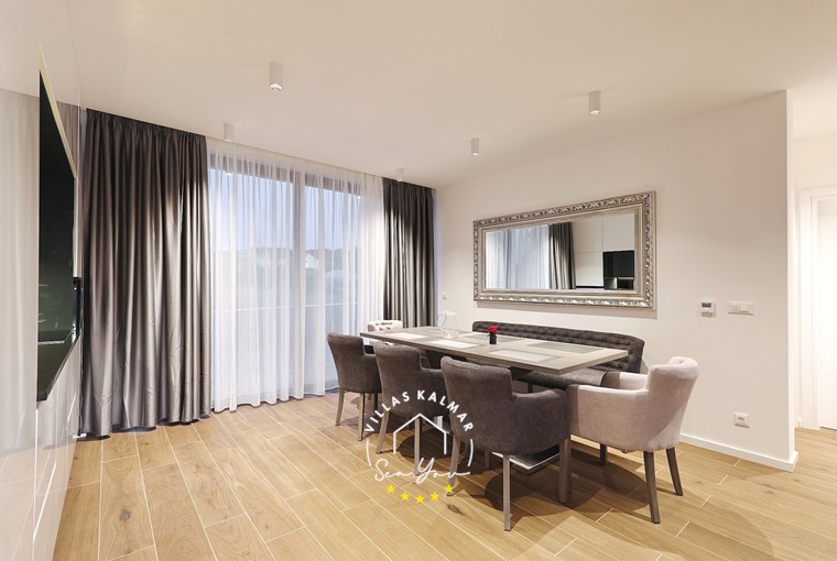 Stylish living room and dining area in Villa K4