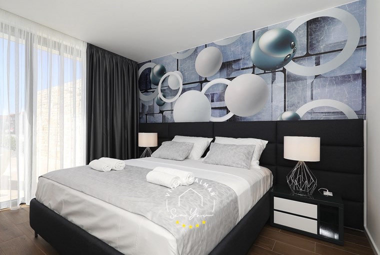 Elegant bedroom with natural light – Villa K4 Pasman Island