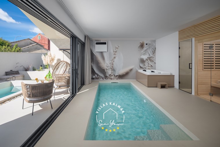 Calming water reflections inside the private indoor pool of Villa Amoreta in Istria