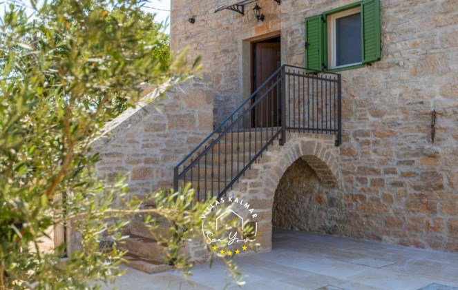 The entrance of the charming, recently renovated stone house Villa Andrea in Central Istria