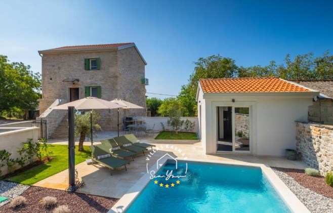 Villa Andrea with outdoor private pool, wellness house and sun loungers with parasols in Central Istria