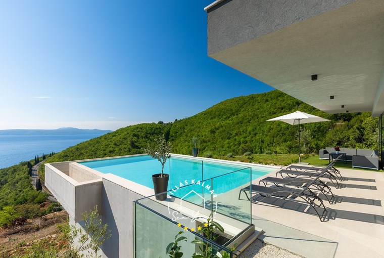 Private pool of villa with sun loungers and panoramic view in Labin