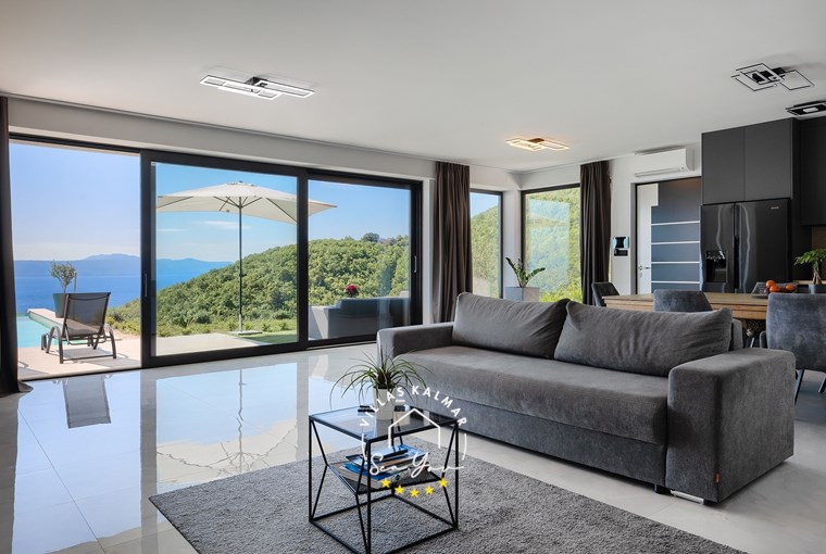 Modern livingroom in villa with panoramic view in villa