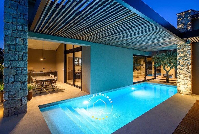 Private pool and outdoor dining area in Villa CasaNova  in Bale